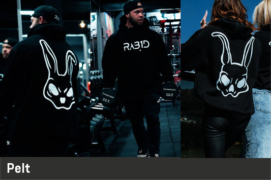 People wearing black hoodies with a white rabbit logo and 'RABID' text.